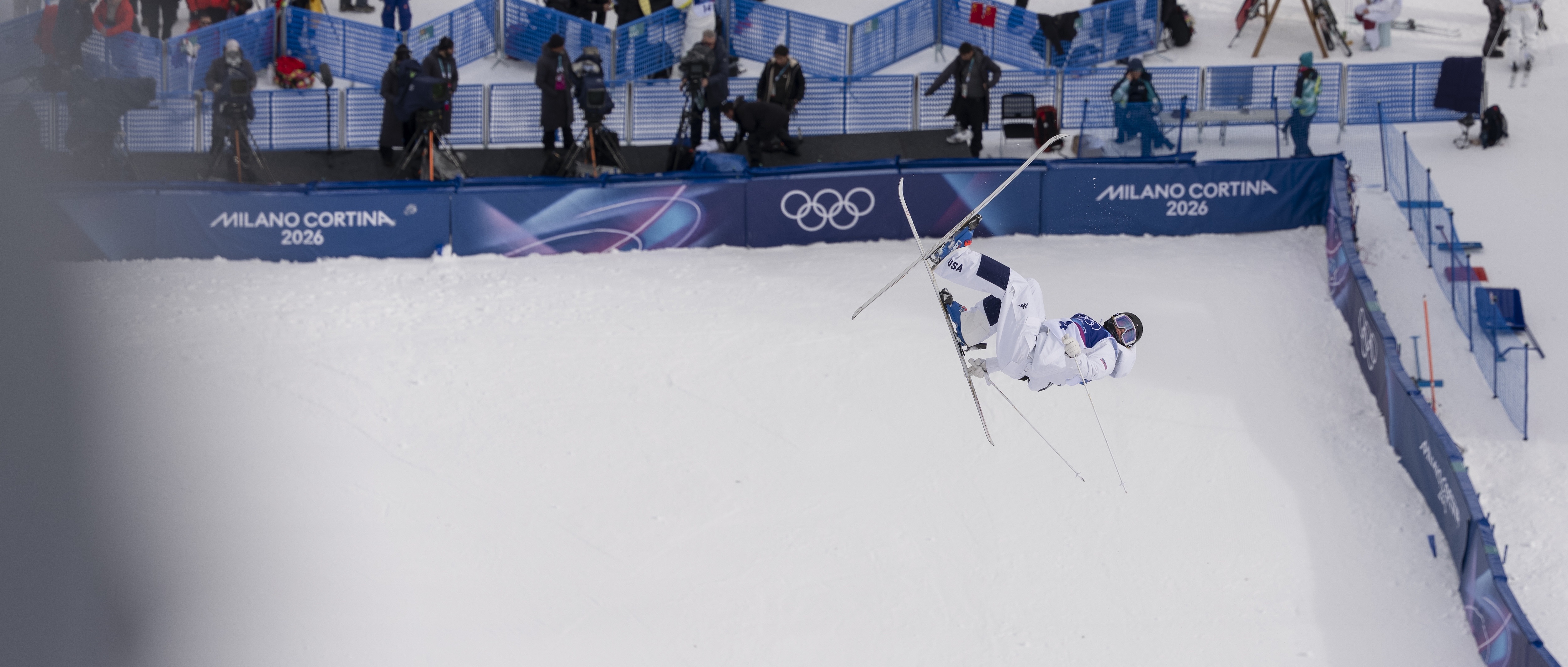 Liz Lemley completes her bottom air trick at the 2026 Olympic Winter Games individual moguls event.