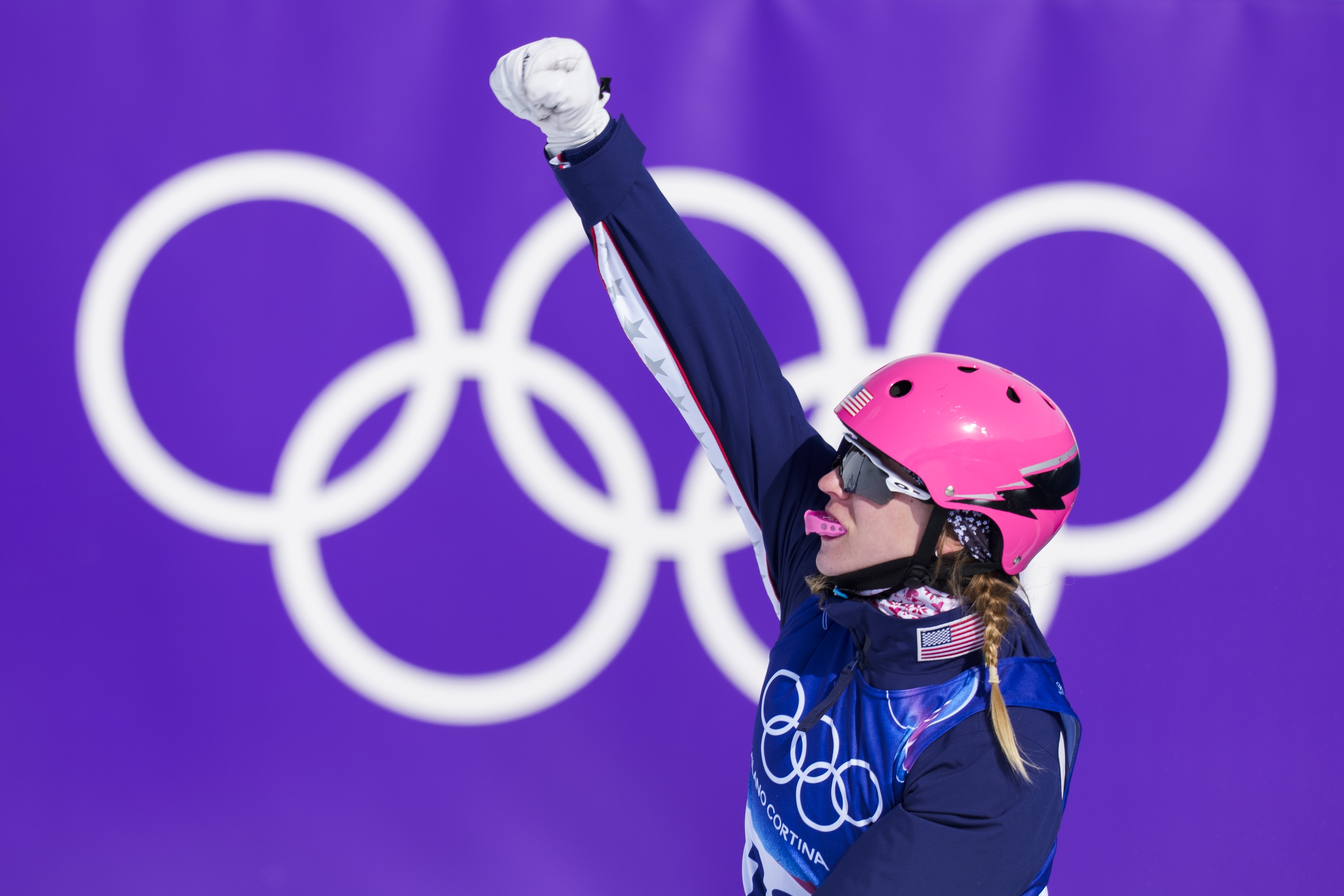 Tasia Tanner celebrates in the finish area at the 2026 Olympic Winter Games
