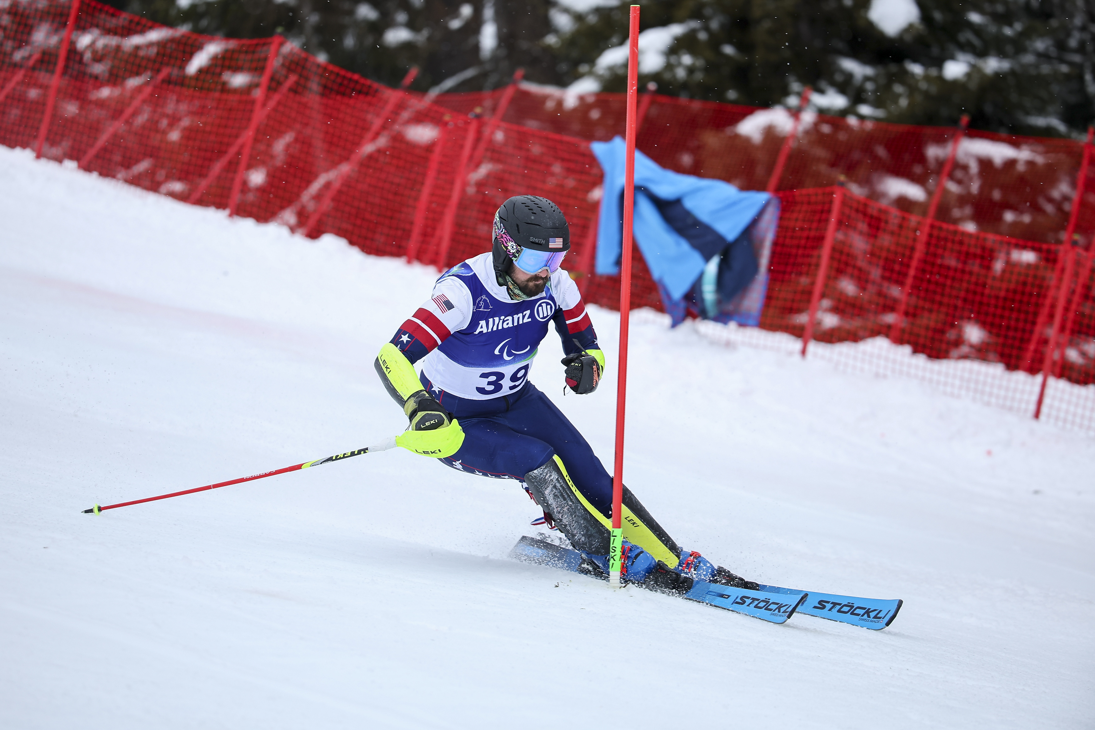 Tyler McKenzie skiing slalom at the 2026 Paralympic Winter Games