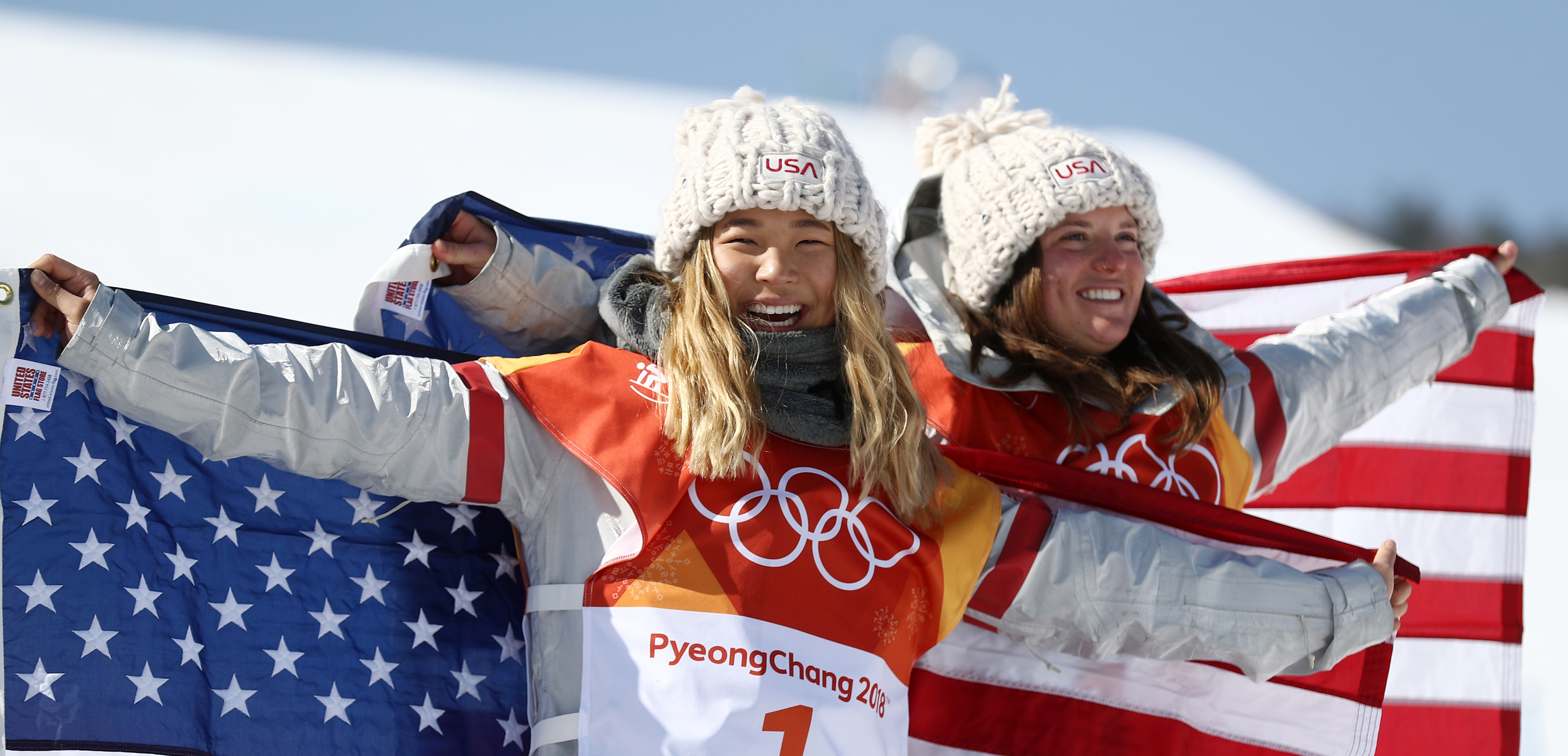 Gold medalist Chloe Kim and bronze medalist Arielle Gold celebrate following the halfpipe final at the 2018 Olympic Winter Games Tuesday. (Getty Images - Clive Rose)