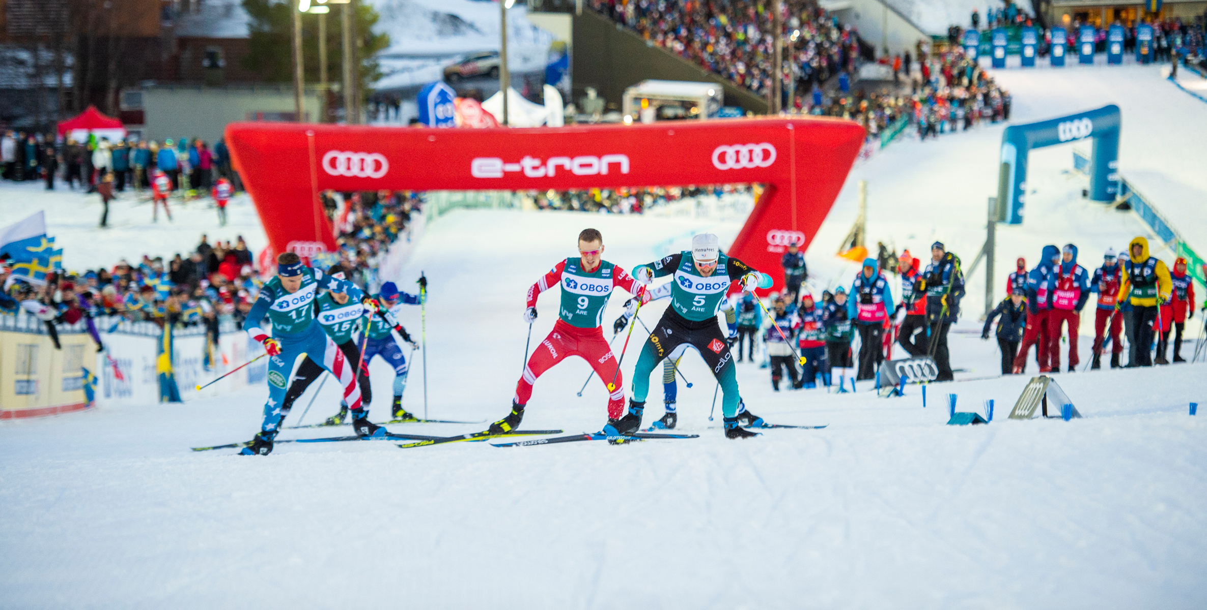 Simi Hamilton (left) led the way for the U.S. men, finishing 14th Tuesday. (www.nordicfocus.com. © Thibaut/NordicFocus)