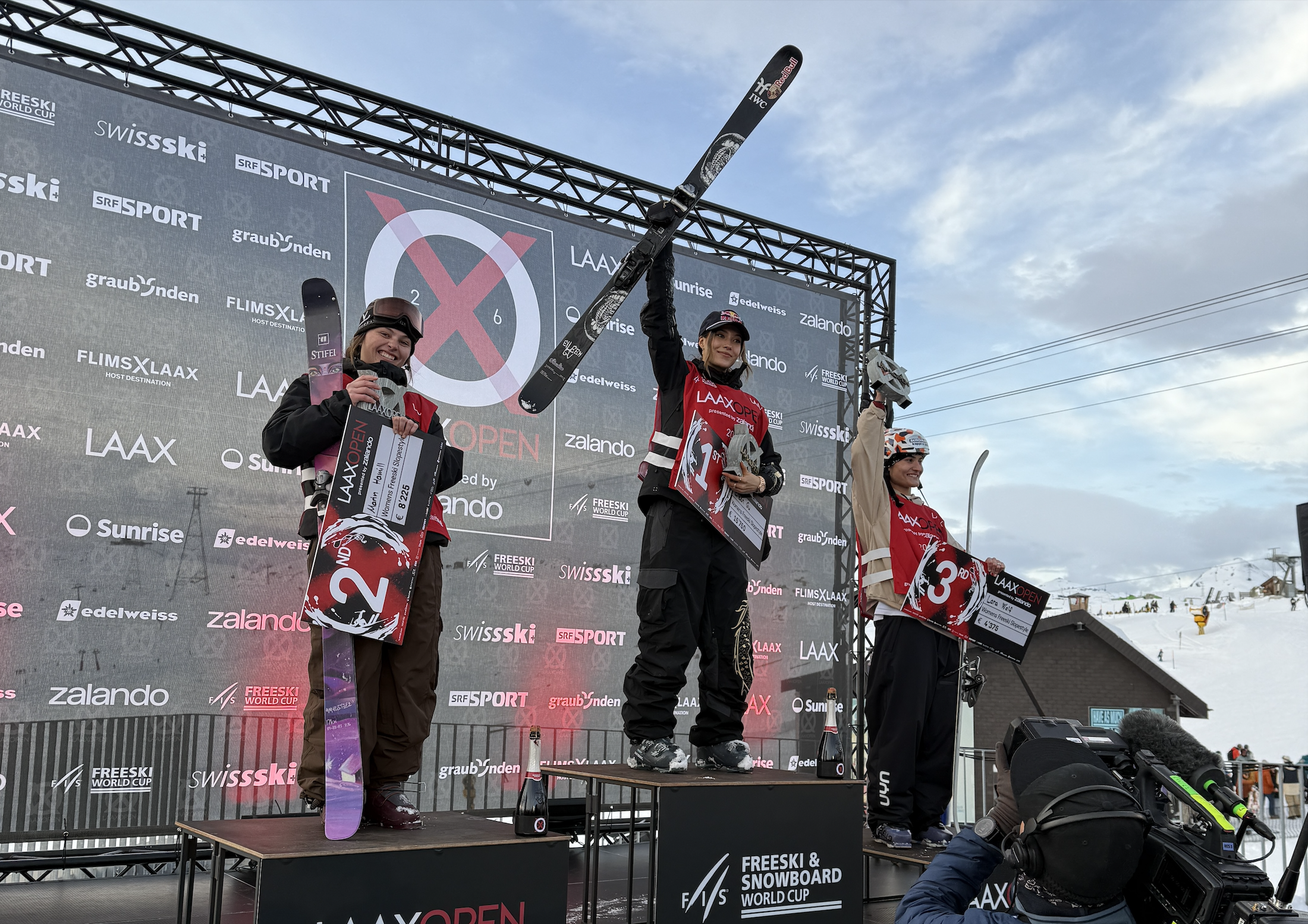 Marin Hamill on the podium at the Laax Open with Eileen Gu (CHN) and Lara Wolf (AUT)