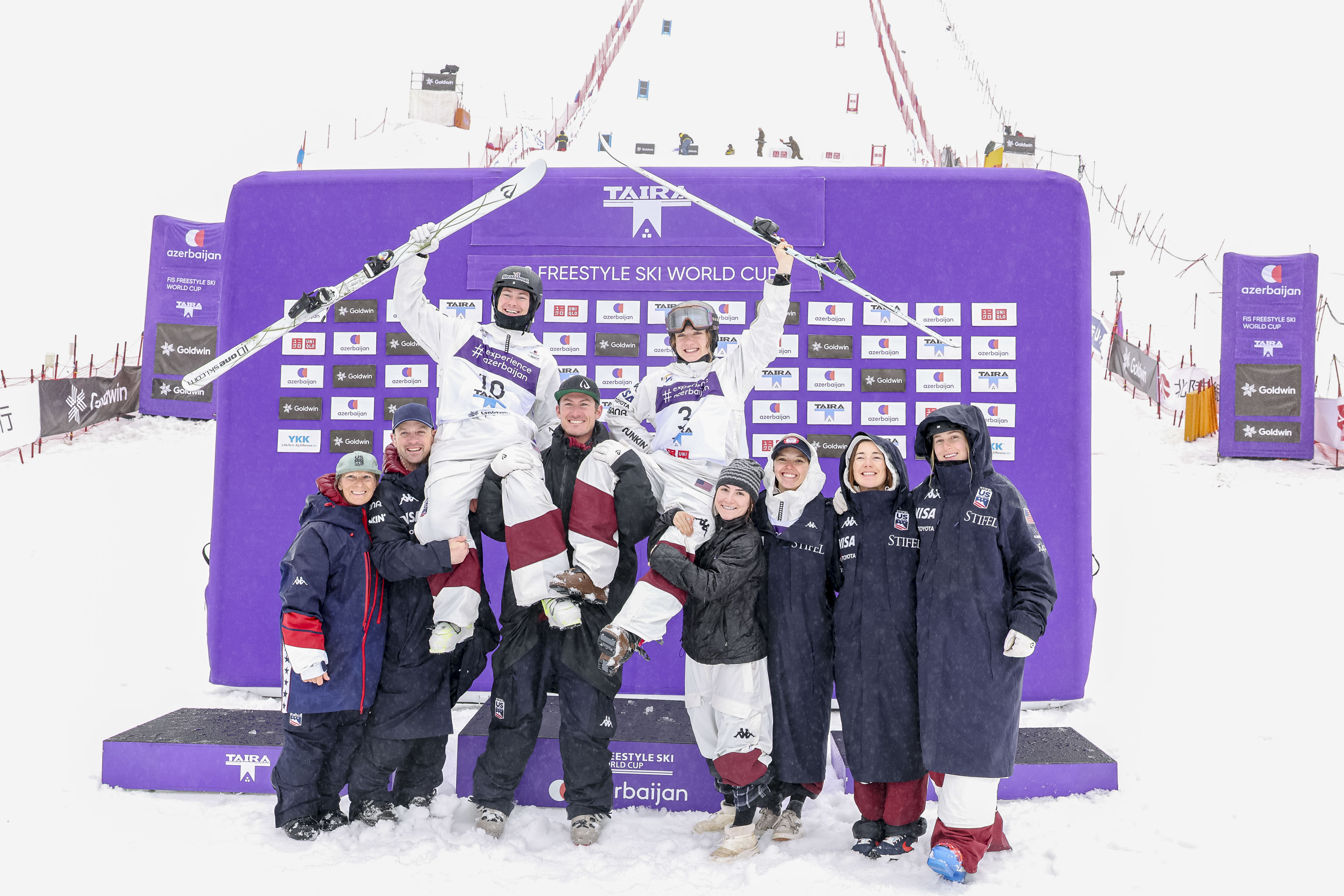 Giaccio and Wendler celebrate on the podium in Japan