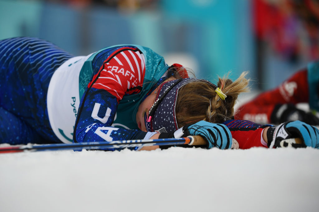 Jessica Diggins lays on the snow after crossing the finishing line on day one of the 2018 Olympic Winter Games at Alpensia Cross-Country Centre. (Getty Images - Quinn Rooney)