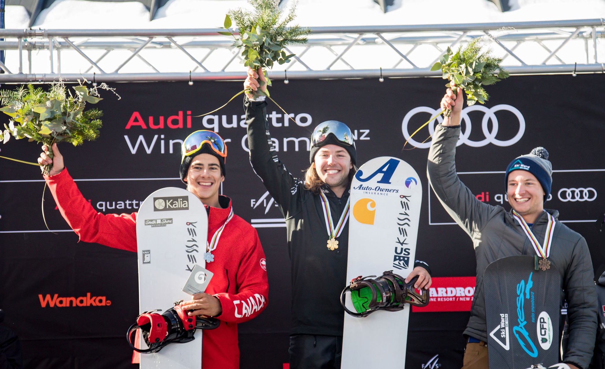 Canada's Eliot Grondin (left) took the silver, Jake Vedder won the gold and Mike Lacroix won the bronze in the men's snowboardcross finals at the 2018 FIS Junior Freestyle Ski &amp; Snowboard World Championships. (Winter Games NZ / Neil Kerr)
