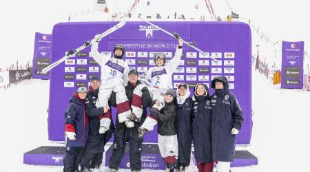 Giaccio and Wendler celebrate on the podium in Japan
