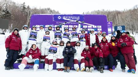 moguls athletes celebrate on the podium in Waterville Valley, New Hampshire