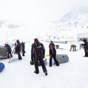 Workers dismantle the venue after the cancellation of the Men's Giant Slalom race at the FIS Alpine Ski World Cup in Soelden, Austria, on October 29, 2017 due to bad weather conditions.