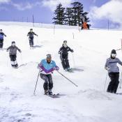 U.S. Moguls team skiing with Jonny Moseley
